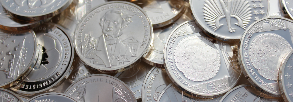 an image of a pile of silver coins