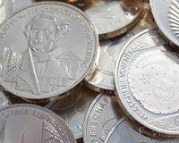 an image of a pile of silver coins