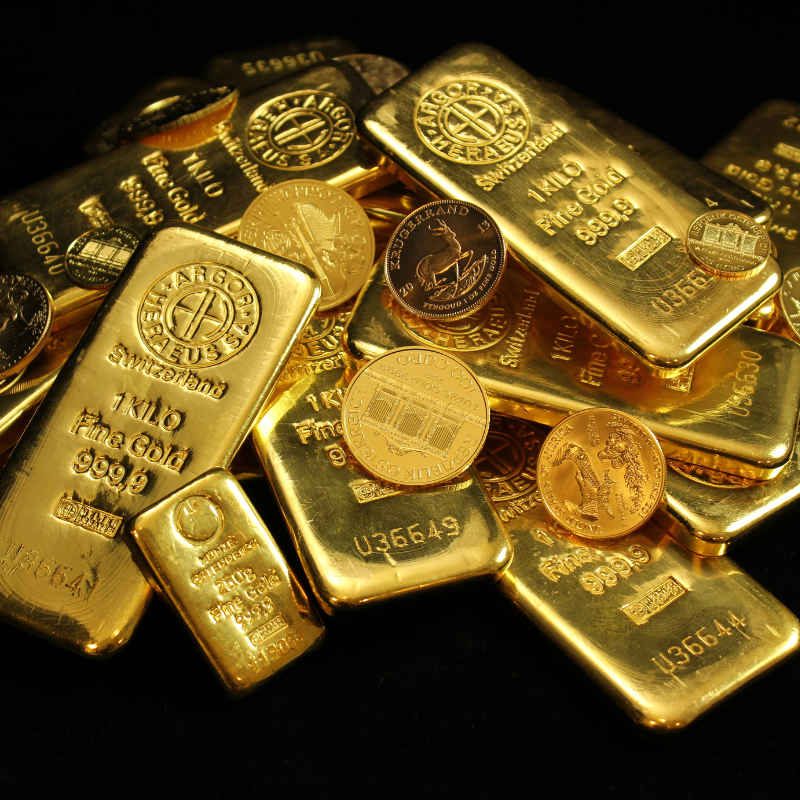 a picture of various gold bullion rounds and bars